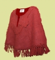 Poncho redondo con broch�