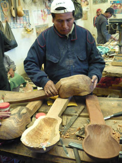 A Charango is being built at the Quispe Torrez factory.